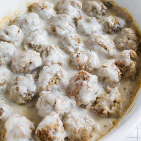 Swedish Meatballs - an easy to make dinner idea with a rich, creamy sauce served over egg noodles.