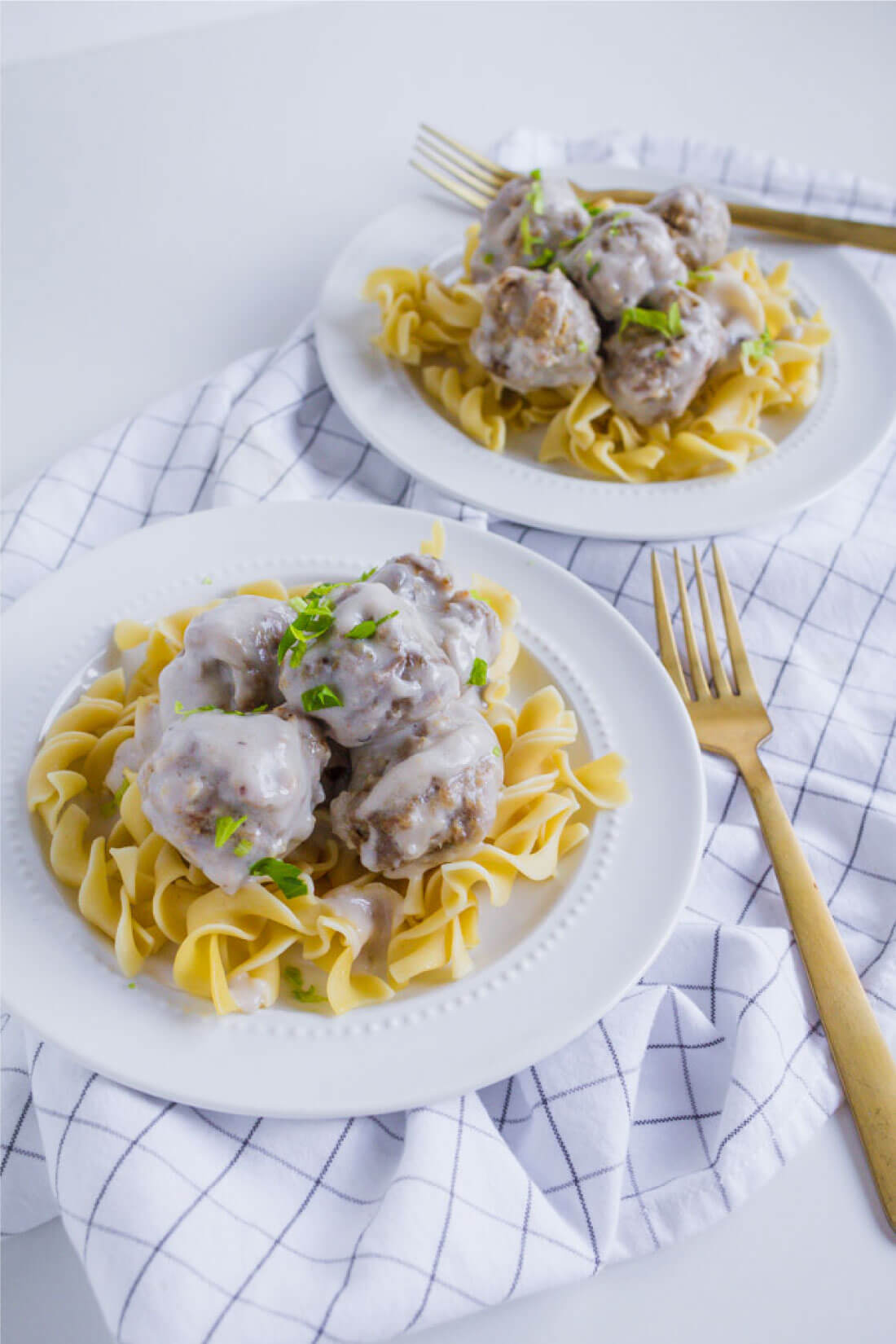 Swedish Meatball Recipe- an easy to make dinner idea with a rich, creamy sauce served over egg noodles.