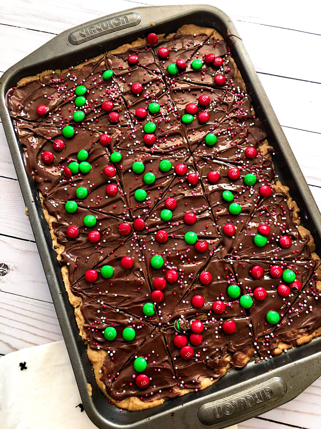 Cut into triangles and serve Christmas Cookie Bars
