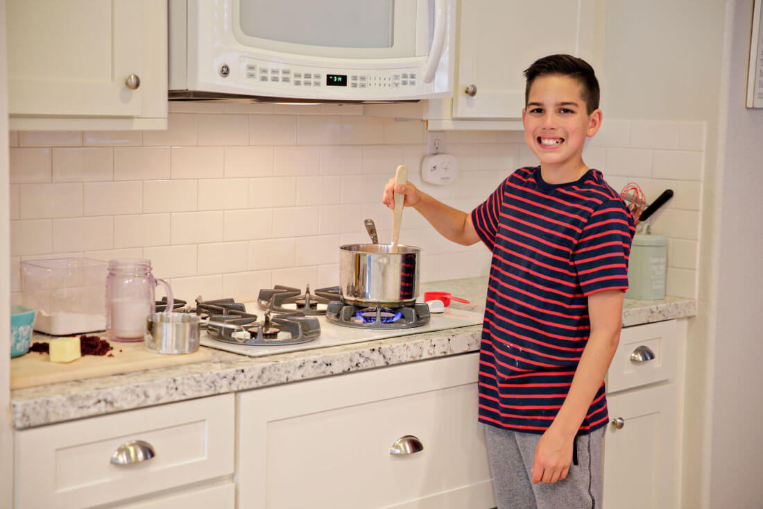 Drew cooking in the kitchen for the holidays.