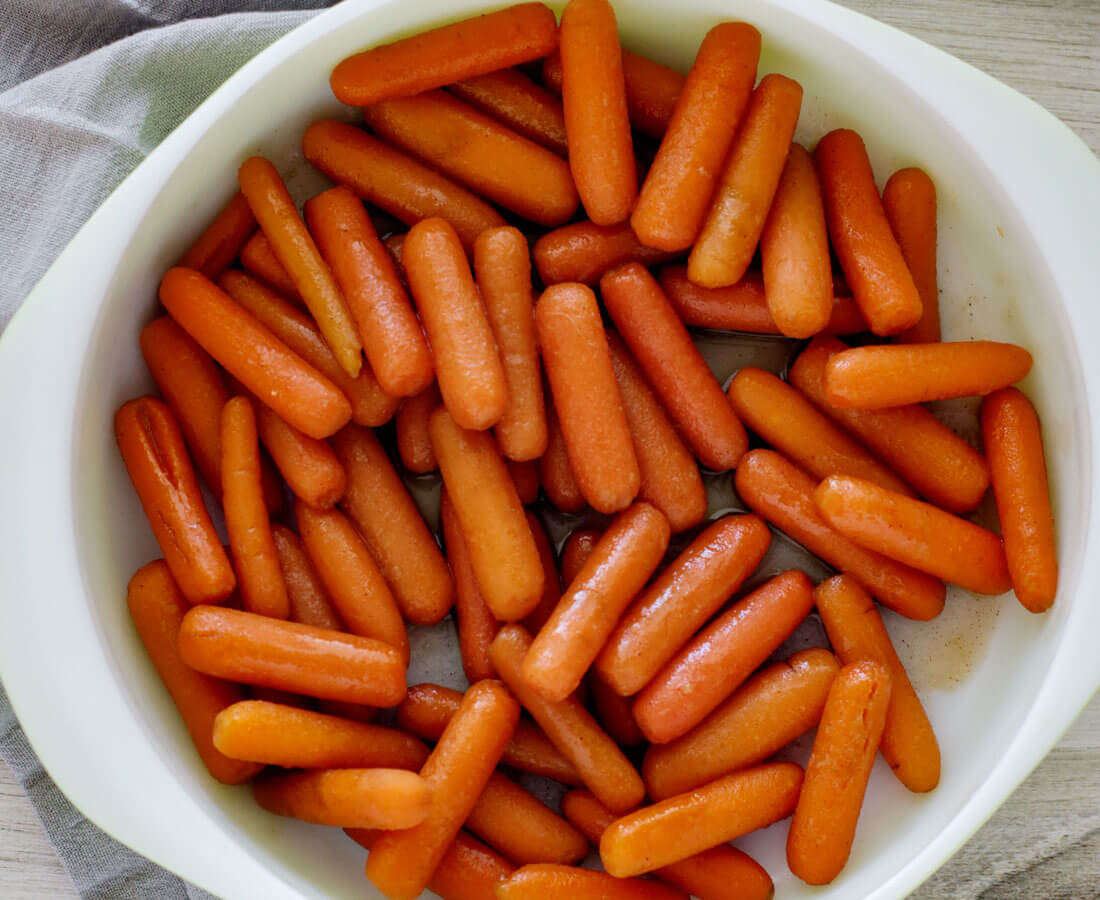 Full bowl of brown sugar glazed carrots - awesome side dish