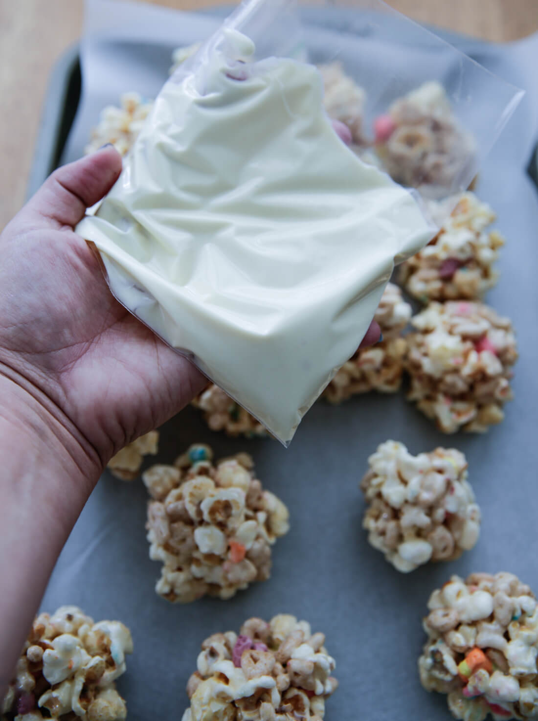 How to make popcorn balls - kicking it up a notch by adding white chocolate and sprinkles