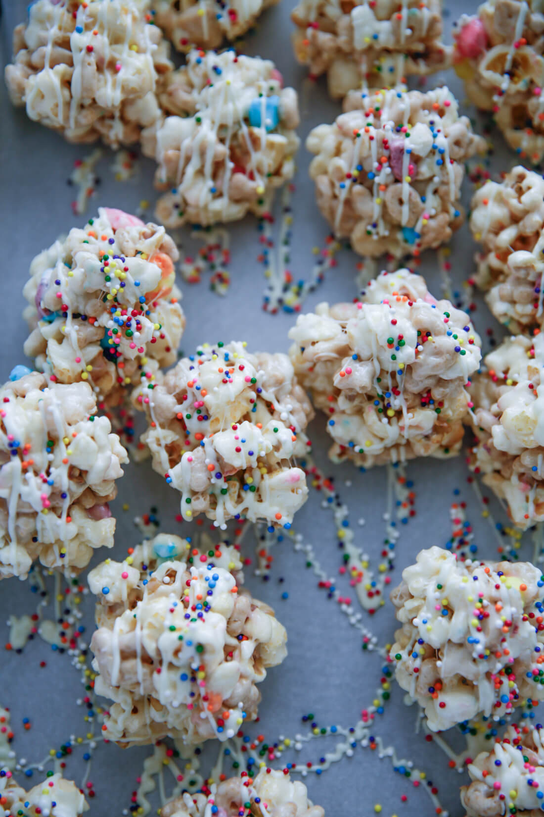 Rainbow Marshmallow Popcorn Balls - ooey gooey, delicious and easy to make.