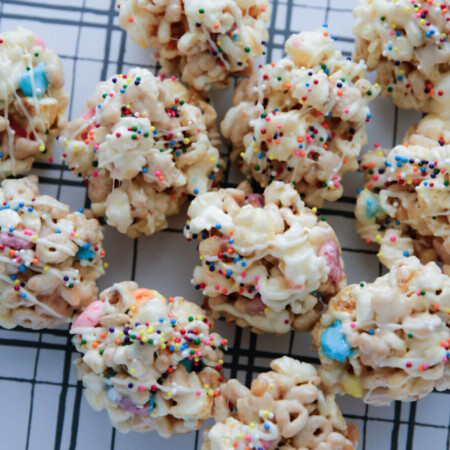 Rainbow Marshmallow Popcorn Balls - using just a few ingredients make these yummy treats.