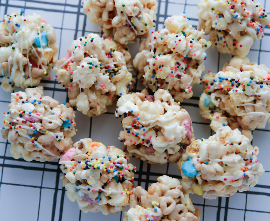 Rainbow Marshmallow Popcorn Balls - using just a few ingredients make these yummy treats.