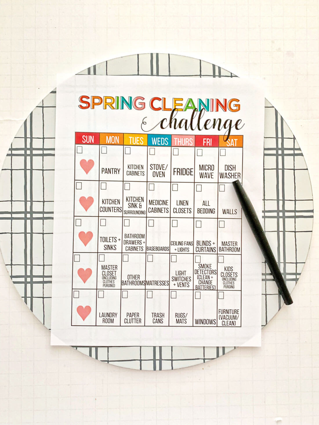 Spring Cleaning List with pen and clipboard