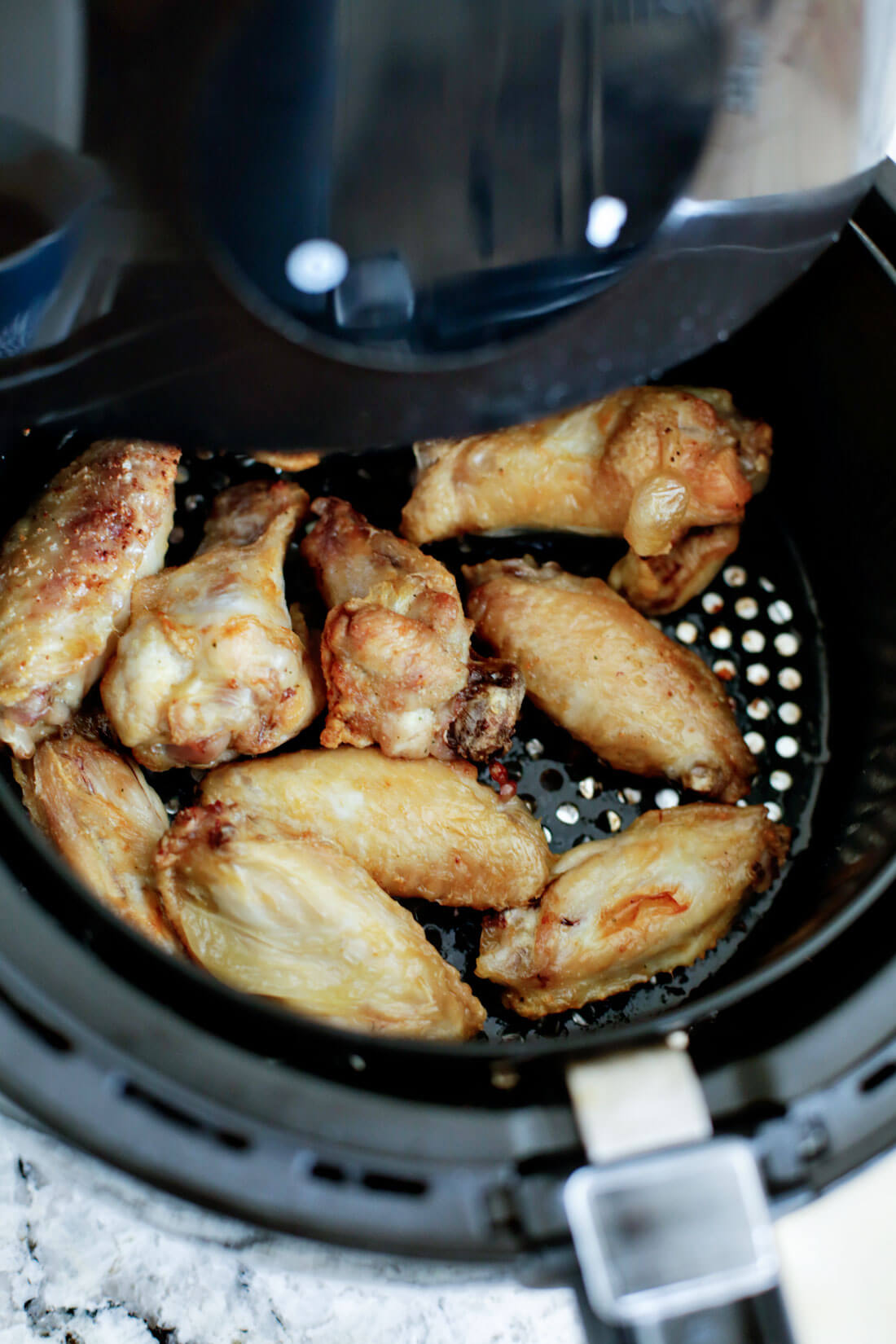 Air Fryer Chicken Wings - half way cooked