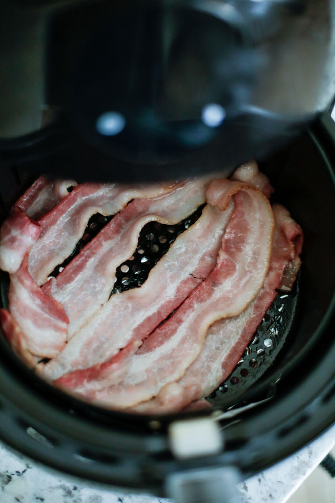 Half way through cooking air fryer bacon