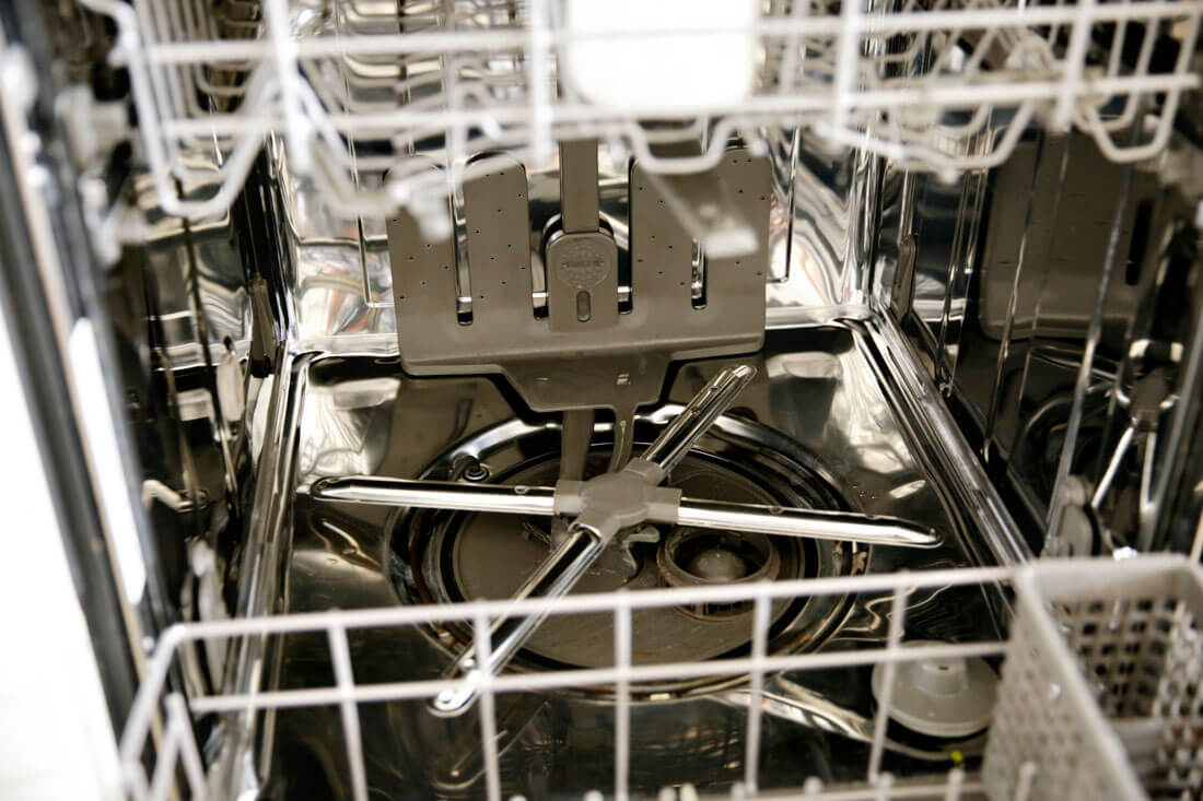 Clean the inside of the dishwasher